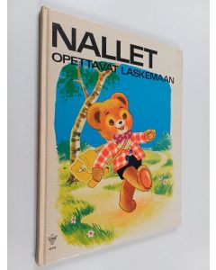 Kirjailijan Francis Phillips käytetty kirja Nallet opettavat laskemaan