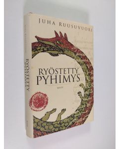Kirjailijan Juha Ruusuvuori käytetty kirja Ryöstetty pyhimys