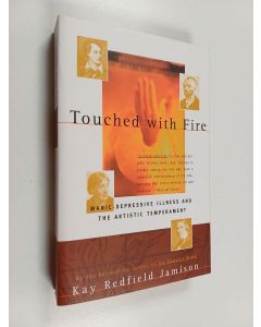 Kirjailijan Kay Redfield Jamison käytetty kirja Touched with fire : manic-depressive illness and the artistic temperament