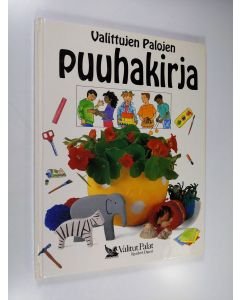 Kirjailijan Lois Rock käytetty kirja Valittujen palojen puuhakirja