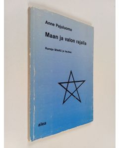 Kirjailijan Anne Pajuluoma käytetty kirja Maan ja valon rajalla : runoja läheltä ja kaukaa