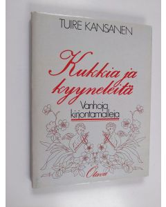 Kirjailijan Tuire Kansanen käytetty kirja Kukkia ja kyyneleitä
