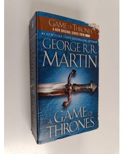 Kirjailijan George R. R. Martin käytetty kirja A game of thrones