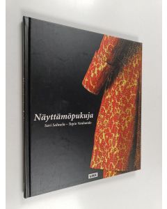 Kirjailijan Sari Salmela käytetty kirja Näyttämöpukuja