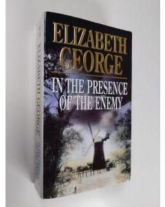 Kirjailijan Elizabeth George käytetty kirja In the presence of the enemy