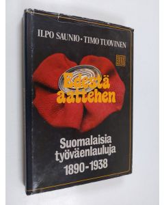 Kirjailijan Ilpo Saunio käytetty kirja Edestä aattehen : suomalaisia työväenlauluja 1890-1938
