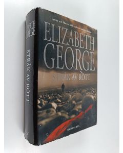 Kirjailijan Elizabeth George käytetty kirja Stråk av rött