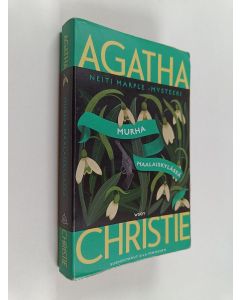 Kirjailijan Agatha Christie k&auml;ytetty kirja Murha maalaiskyl&auml;ss&auml;