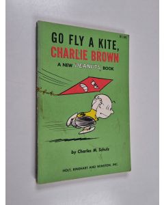 Kirjailijan Charles M. Schulz käytetty kirja Go fly a kite, Charlie Brown