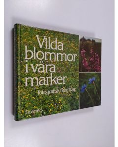 Kirjailijan Rolf Jonsson käytetty kirja Vilda blommor i våra marker : fotografisk flora i färg