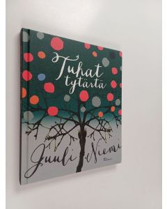 Kirjailijan Juuli Niemi käytetty kirja Tuhat tytärtä