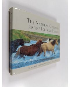Kirjailijan Sigurður A. Magnússon käytetty kirja Íslenski hesturinn : litir og litbrigði Den islandske hest og dens farver = Das Islandpferd und seine Farben = The natural colours of the Iceland horse