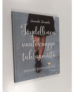 Kirjailijan Hannele Lampela käytetty kirja Täydellinen vaatekaappi tuhlaamatta : onnellisen ostamisen salaisuus