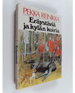 Kirjailijan Pekka Reinikka käytetty kirja Eräystäviä ja kylän koiria