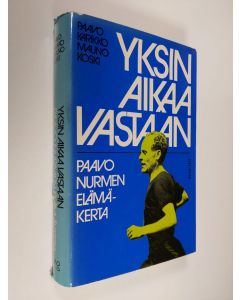 Kirjailijan Paavo Karikko käytetty kirja Yksin aikaa vastaan : Paavo Nurmen elämänkerta