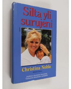 Kirjailijan Robert Coram & Christina Noble käytetty kirja Silta yli surujeni