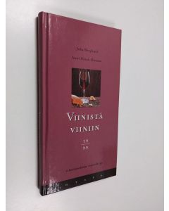 Kirjailijan Juha Berglund käytetty kirja Viinistä viiniin 1999 : viininystävän vuosikirja