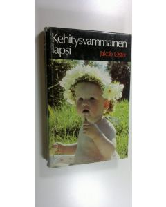 Kirjailijan Jakob Öster käytetty kirja Kehitysvammainen lapsi : lääketieteellisiä, pedagogisia, sosiaalisia ja psygologisia ongelmia