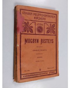 Kirjailijan Charles Dickens käytetty kirja Mugbyn risteys