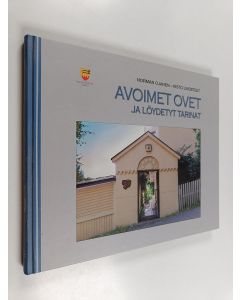 Kirjailijan Norman Ojanen käytetty kirja Avoimet ovet ja löydetyt tarinat