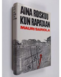 Kirjailijan Mauri Sariola käytetty kirja Aina roiskuu kun rapataan : poliisiromaani