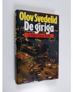 Kirjailijan Olov Svedelid käytetty kirja De giriga : en Roland Hassel-thriller