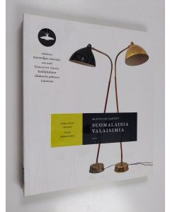 Kirjailijan Anna-Kaisa Huusko käytetty kirja Suomalaisia valaisimia