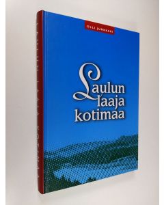 Kirjailijan Olli Junkkari käytetty kirja Laulun laaja kotimaa : kuoro- ja musiikkitoimintaa luovutetussa Karjalassa