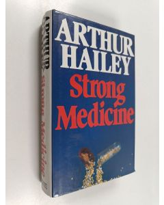 Kirjailijan Arthur Hailey käytetty kirja Strong medicine