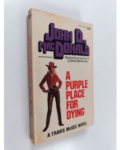 Kirjailijan John Dann MacDonald käytetty kirja A purple place for dying