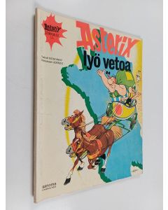 Kirjailijan Goscinny & Uderzo käytetty kirja Asterix lyö vetoa