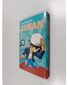 Kirjailijan Gosho Aoyama käytetty kirja Salapoliisi Conan 62 (ERINOMAINEN)