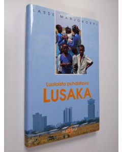 Kirjailijan Lasse Marjokorpi käytetty kirja Luuloista puhdistava Lusaka