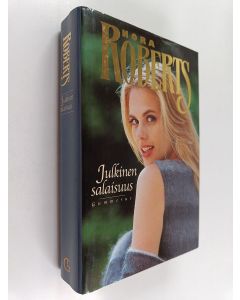 Kirjailijan Nora Roberts käytetty kirja Julkinen salaisuus