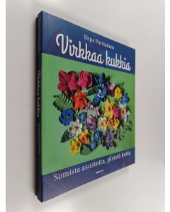 Kirjailijan Sirpa Parviainen uusi kirja Virkkaa kukkia : somista asusteita, piristä kotia