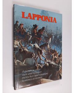 Kirjailijan Dino Sassi käytetty kirja Lapponia : ihminen ja poro = men and reindeer = Menschen und Renntiere