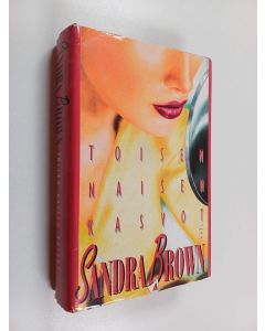 Kirjailijan Sandra Brown käytetty kirja Toisen naisen kasvot