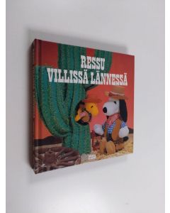 Kirjailijan Charles M. Schulz käytetty kirja Ressu Villissä lännessä