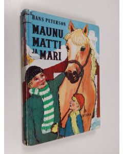 Kirjailijan Hans Peterson käytetty kirja Maunu, Matti ja Mari : kertomus