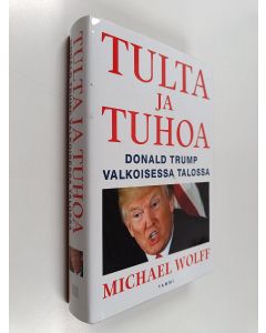 Kirjailijan Michael Wolff käytetty kirja Tulta ja tuhoa : Donald Trump Valkoisessa talossa