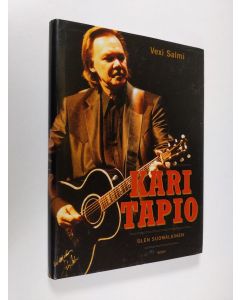 Kirjailijan Vexi Salmi käytetty kirja Kari Tapio : olen suomalainen