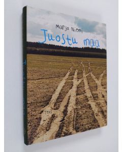 Kirjailijan Marjo Niemi käytetty kirja Juostu maa