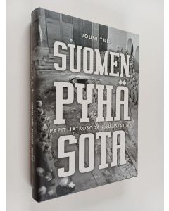 Kirjailijan Jouni Tilli käytetty kirja Suomen pyhä sota : papit jatkosodan julistajina