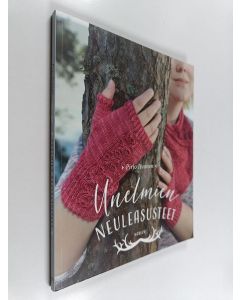 Kirjailijan Pirjo Iivonen käytetty kirja Unelmien neuleasusteet