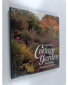 Kirjailijan Sue Phillips käytetty kirja Creating a gottage garden