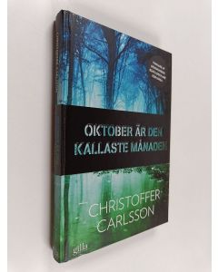 Kirjailijan Christoffer Carlsson käytetty kirja Oktober är den kallaste månaden