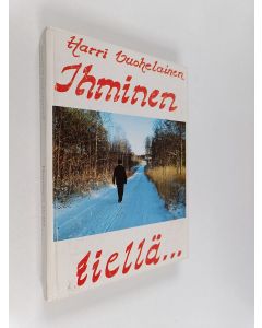 Kirjailijan Harri Vuohelainen käytetty kirja Ihminen tiellä