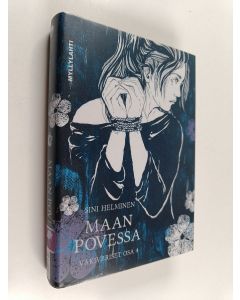 Kirjailijan Sini Helminen käytetty kirja Maan povessa : maan kirja