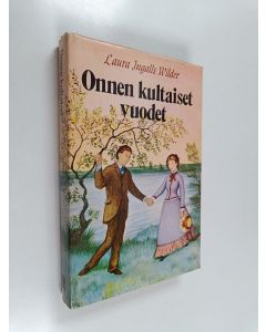 Kirjailijan Laura Ingalls Wilder käytetty kirja Onnen kultaiset vuodet