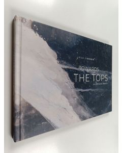 Kirjailijan Eija Timonen käytetty kirja Towards the tops - Huippuja kohti